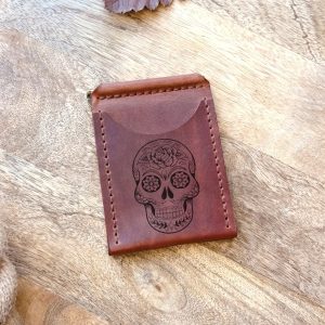 Wallet with a money clip and skull, handmade from leather, with personalized engraving of an image and text. A perfect gift for a man