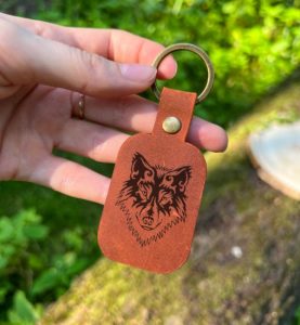 Leather keychain with wolf personalized handmade with engraving of name, initials, date, name of any text or image. The best gift for a man.