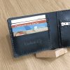 Personalized wallet for 4 cards with engraving, handmade from black leather, with a compartment for banknotes and a coin pocket with name, initials, etc.
