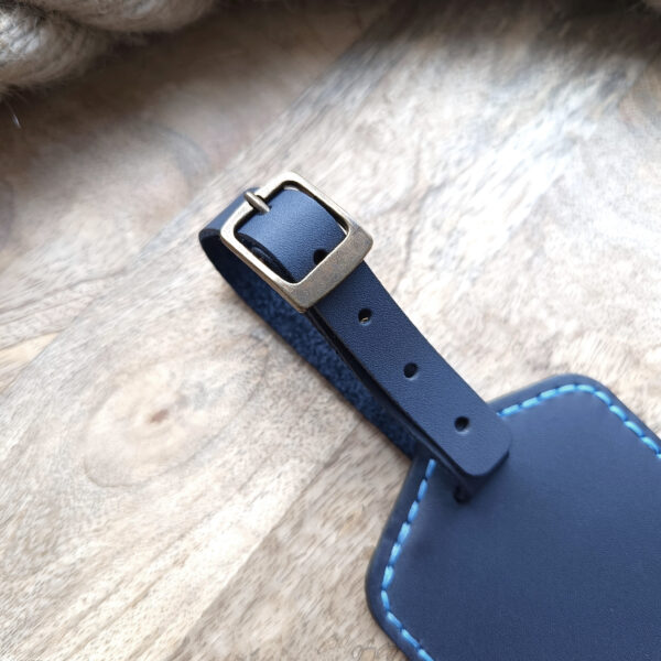Custom travel tag handmade from dark blue leather with engraving monogram, logo, name, initials, phone number or text and pictures etc.