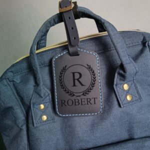 Custom travel tag handmade from dark blue leather with engraving monogram, logo, name, initials, phone number or text and pictures etc.